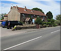 Row of four houses at the northern edge of Westerleigh