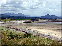 SH4437 : A view eastwards along the coast from Afon Wen by John Lucas