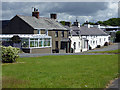 Cottages beside the A497 road