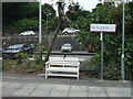 Bench and station sign, St Austell Railway Station