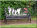 TG2701 : New memorial seat in Poringland's Memorial Garden by Evelyn Simak