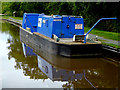 Canal maintenance boat near Ravensmoor, Cheshire