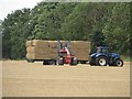 NZ2390 : Loading straw north of Broomhaugh by Graham Robson
