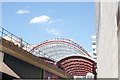 View of Canary Wharf DLR station from Mackenzie Walk