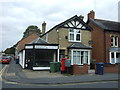 Shop and house on Station Road, March