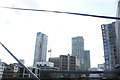 View of Hotel Novotel Canary Wharf, Britannia Hotel and Pan Peninsula apartments from the footbridge leading from South Quay