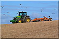 NT8649 : Tractor on skyline with seagulls by David Martin