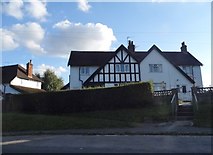 SU7099 : Houses on the A40, Postcombe by David Howard