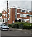 Two dark green telecoms cabinets near Hotel Ibis Budget, Newport