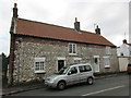 Chalk cottages on Hunmanby Street, Muston