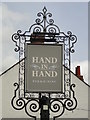 Hanging sign for the Hand in Hand