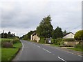 Houses by A4421 in Newton Purcell