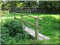 Footbridge and stile by the A518 roundabout