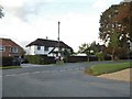 Wolsey Road at the junction of Sandy Lodge Lane