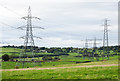 NZ1550 : Two sets of electricity transmission lines by Trevor Littlewood
