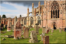 NT5434 : Melrose Abbey and graveyard by Walter Baxter