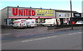 ST1774 : United premises and vans, Sloper Road, Cardiff by Jaggery