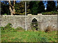 Fenced-off opening in stone wall, Howard Street,  Clydach Vale