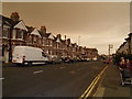 TQ3204 : Queens Park Road, unusual colour sky by Paul Gillett
