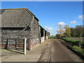 Ashwell End: weatherboarding at Bluegates Farm