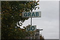 View of a Grab and Go sign next to a sandwich kiosk on Blackhorse Lane