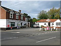 Trunch Corner Stores and Village Sign