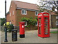 TF6424 : Elizabeth II postbox and telephone box on Priory Lane, North Wootton by JThomas