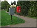 TF6424 : Elizabeth II postbox on All Saints Drive, North Wootton by JThomas