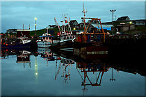 HU5362 : Symbister Harbour, Whalsay, during the "Simmer Dim" by Donald MacDonald