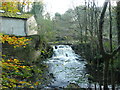 Waterfall over a weir on Harden Beck