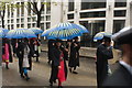 View of people with umbrellas in the Lord Mayor