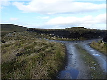 NH5917 : Moorland track junction by Richard Law