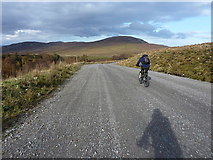 NH5415 : Riding down the Corriegarth access road by Richard Law