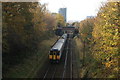 View of a London Overground Class 317 heading for Walthamstow Central station on Vestry Road bridge