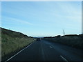 A635 and a lone tree at Knowl Height