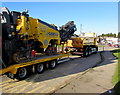 Yellow road maintenance lorry and trailer, Bettws Road, Bettws