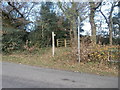 Sign and footbridge to footpath to Rhiwfelin Fach Farm