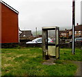 Shell of a former phonebox, Y Wern, Bettws