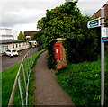 Queen Elizabeth II postbox alongside a public footpath in Honiton