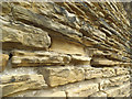 Eroded stone wall on Armley Ridge Road - detail