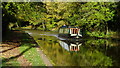 Narrow boat on Shropshire Union Canal by Berrisford Rd Bridge near Market Drayton