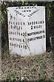 Old Milepost by the former B5130 at Caldecott Green