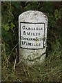 Old Milestone by the A595, west of West Woodside