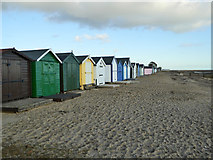 TM0212 : Beach huts, West Mersea by Robin Webster