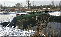 SK5702 : Pipe across a frozen River Biam by Mat Fascione