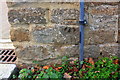 Benchmark on Bloxham School building, Courtington Lane