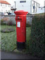 SE4081 : Elizabeth II postbox outside Carlton Miniott Post Office by JThomas