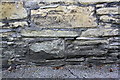 Benchmark on North Avenue wall