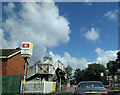 Waiting at the level crossing at Hall Road station