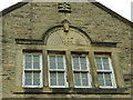 Datestone on the former coach house, St Ives Estate